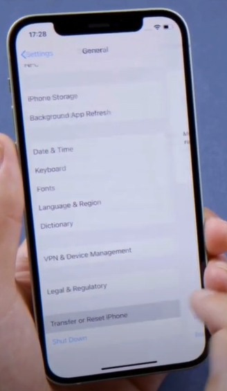 Tap on transfer or reset iPhone